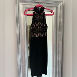 A beautiful Bebe Dress- intricately detailed neckline - worn once!